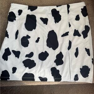 SHEIN cow print mini skirt.